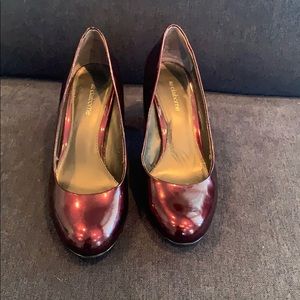 Burgundy red patent leather pumps